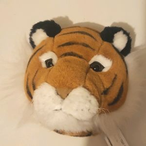 Wall decor stuffed tiger.